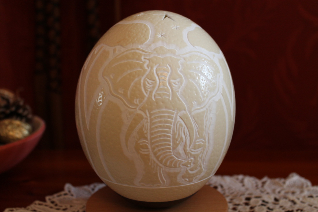 Holes All over Hand Carved Ostrich Egg Lamp with metal electric base 